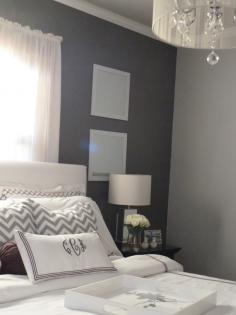 I like the dark gray accent wall behind the bed