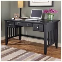 Arts and Crafts Executive Desk - Black by Home Styles 5181-15. Mission Styling at its best! The Arts & Crafts Executive Desk embellishes typical mission styling with framed doors showcasing raised wood, lattice moldings and slightly flared legs. The drop-front center drawer can also be used as a keyboard tray with two additional storage drawers on each side. Construction is of poplar solids and engineered wood in a Black finish. Size: 54w 28d 30h Specification This item includes: HS-5181-15 Arts and Crafts Executive Desk - Black - Home Styles Please refer to the Specifications to determine what items are included since sometimes the image shows more or less items. If you are not sure, please contact us and our customer service will be glad to help.
