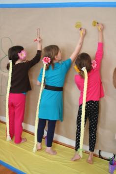 Love the idea of covering wall with paper and letting the kids get creative. Good for birthday party activity or just a rainy day.