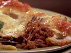 
                    
                        Get this all-star, easy-to-follow Cheesy Pork Enchiladas recipe from Patrick and Gina Neely.
                    
                