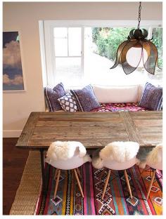 Dining room - casual, rug overlay, hides on chairs #diningroom #rug