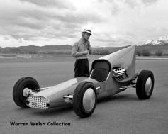 This 1956 effort of Brent Tyler and Warren Welsh was without a doubt one of trickiest setups of drag racing's first decade. It had a Cord front wheel drive differential turned around and the ring gear flopped to use as a rear end. Swing axles, Morris Minor torsion bars, 392 Chrysler with a torque converter, Novi blower, home made fuel injector, twin I beam front end, etc, etc. Brent was somewhat of a mad scientist with Warren the test pilot. Brent never, never built a conventional car or boat.