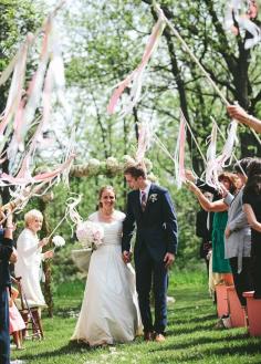 
                    
                        Add a dash of fun and flair to your exit with ribbon wands waving through the air in your wedding colors. Wedding Ideas, Ceremony, Wedding Send Off Ideas
                    
                