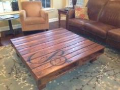 I love this monogrammed table made of pallets!! May have to make another trip to Lowe's
