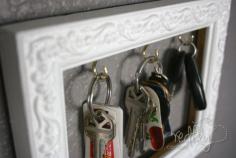 An old picture frame and a few small cup hooks can be turned into a great place to keep your keys organized. Just remove the glass from the frame and insert the hooks to hang your keys. - 150 Dollar Store Organizing Ideas and Projects for the Entire Home  Didn't go thru all the tips, but like the frame key holder.
