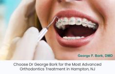 Dr George Bork at his dental office, proud to offer advanced orthodontic technique to fast track your orthodontic problem. Whether you need interceptive orthodontics for kids, braces or tooth-colored brackets, he will help you. 