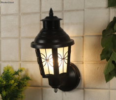 Introducing our "Gentle Black Iron Outdoor Wall Gate Light" – the perfect blend of functionality and aesthetics to enhance the beauty and security of your home's entrance. Crafted with precision and designed to make a lasting impression, this exquisite gate light is a must-have for any homeowner seeking to elevate their outdoor space. Tap on the link - https://www.woodenstreet.com/outdoor-wall-lights