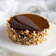 Explore the Delightful Hazelnut Praline Mousse Cake Online at Theobroma

Explore the mouthwatering hazelnut praline mousse cake at Theobroma. Head to our website and indulge in this dessert crafted to appease your cravings. Enjoy its heavenly taste at the best online prices.
