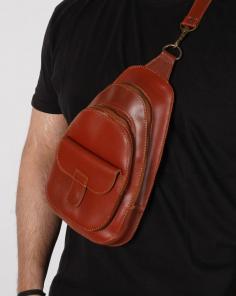 Our leather bags are the model of style and function. Made with high-quality leather and canvas, they are designed to last a lifetime. Our bags includes sling bag, tote bag, backpacks, coffin bags, messenger bag, and shoulder holster bag. Whether you're looking for a backpack for your next hiking trip or a messenger bag for your daily routine, our bags are the perfect choice. With their timeless design and sturdy construction, they are sure to become your go-to accessory.