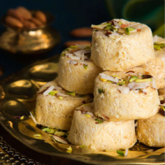 Indulge in the luxurious taste of 24 Carats Mithai Magic's Golden Sonpapdi. Crafted with the finest ingredients and infused with edible gold, this traditional Indian sweet delicacy is a delightful blend of rich flavors and exquisite craftsmanship. Perfect for special occasions or as a unique gift, each bite offers a touch of opulence and a taste of pure indulgence. Treat yourself to the decadent experience of Golden Sonpapdi and elevate your dessert game to a whole new level.