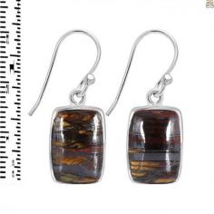 Iron Tiger Eye Earrings - A Stone With The Image Of A Powerful Spirit Animal

Blow cooling air on your heated thoughts that almost bring your temper to the thermal threshold and gradually seep you into the transitional version of such boldness of hawk's eye and Tiger's eye with the perfect balancing taste of harmony and comfort by grace this rare, potent "three-layered stone" protecting the spirits while manifesting the will power. Would a hard stone strengthen a mature nature? Well! You are correct in assuming that a valuable stone with a name like "Iron Tiger's Eye" conjures up images of a powerful spirit animal that cannot be ordinary. The stone's strong presence stands out in a sea of other stones. As a result, Iron Tiger Eye Jewelry may be used as a practical prank on someone.
