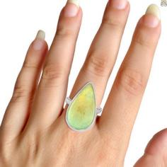 Sterling Opal Ring : The Galaxy Stone

The synthetic gemstone sterling opal has properties and appearance that closely mimic those of natural opal. It is created by growing silica spheres in a controlled environment and arranging them in a regular pattern. As a result, this gemstone displays a high degree of play of color when viewed from different angles. One of the trade names for this gemstone is Monarch Opal. Wearing a sterling opal ring can also have some healing benefits. It can provide emotional support and help the wearer handle their emotions gracefully, thus becoming emotionally intense and balancing their feelings.