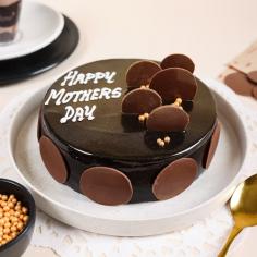 Indulge in the rich delight of our Graceful Mother's Day Truffle Cake, a decadent blend of velvety chocolate and love. Perfect for celebrating mom!
