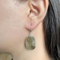 Understanding the Purpose and Past Stories of Spectropyrite Druzy
The other names of Spectropyrite Druzy are rainbow pyrite or peacock pyrite. It is a mesmerizing gemstone renowned for its iridescent and metallic sheen. Because of its brilliant hues and brightness, this crystal is often used in trendy and stylish Spectropyrite Druzy Jewelry and decorative products. It gives an enchanting color play when light hits its surface, giving any item that is decorated with it a magical touch.